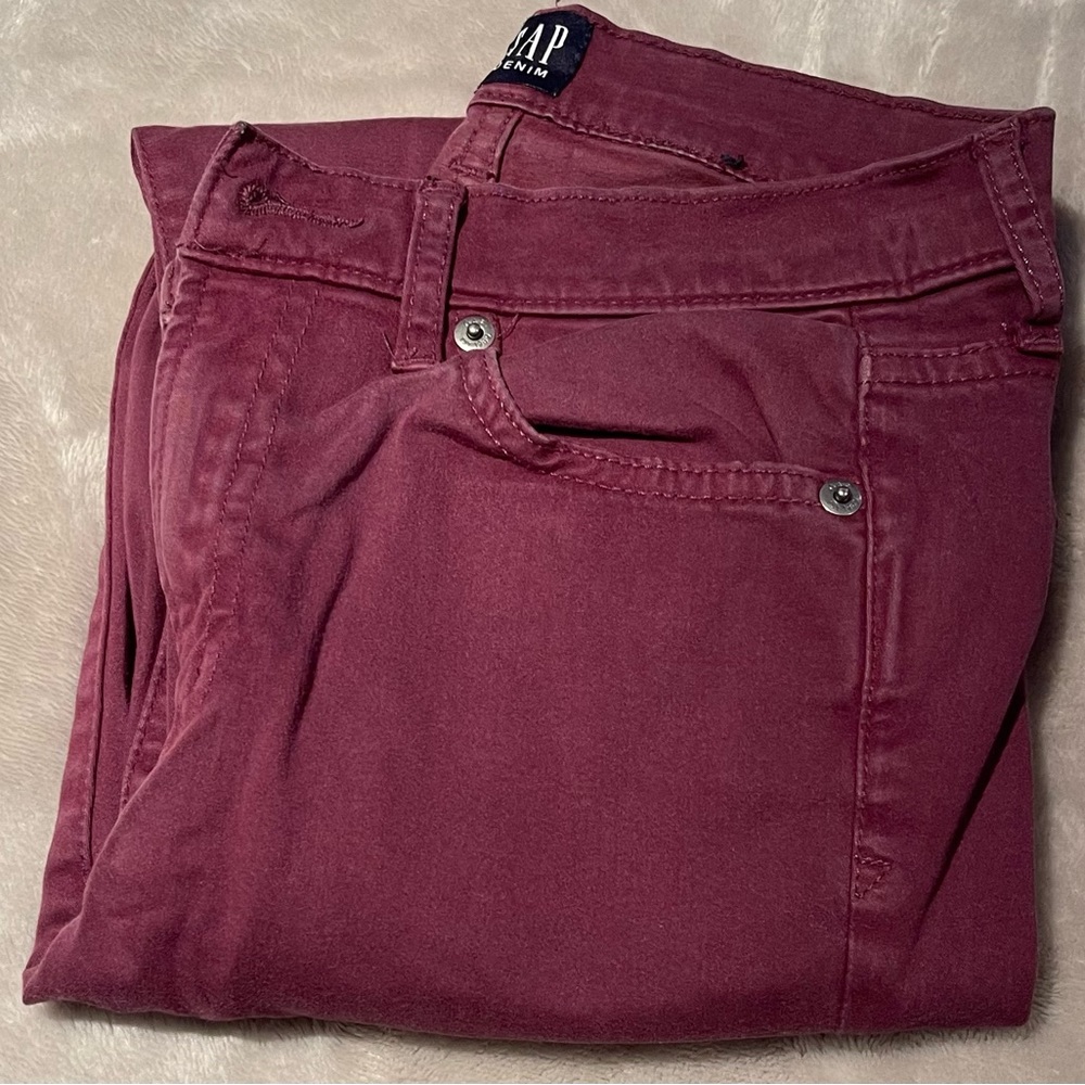 Gap Womans true skinny deep purple colored jeans.